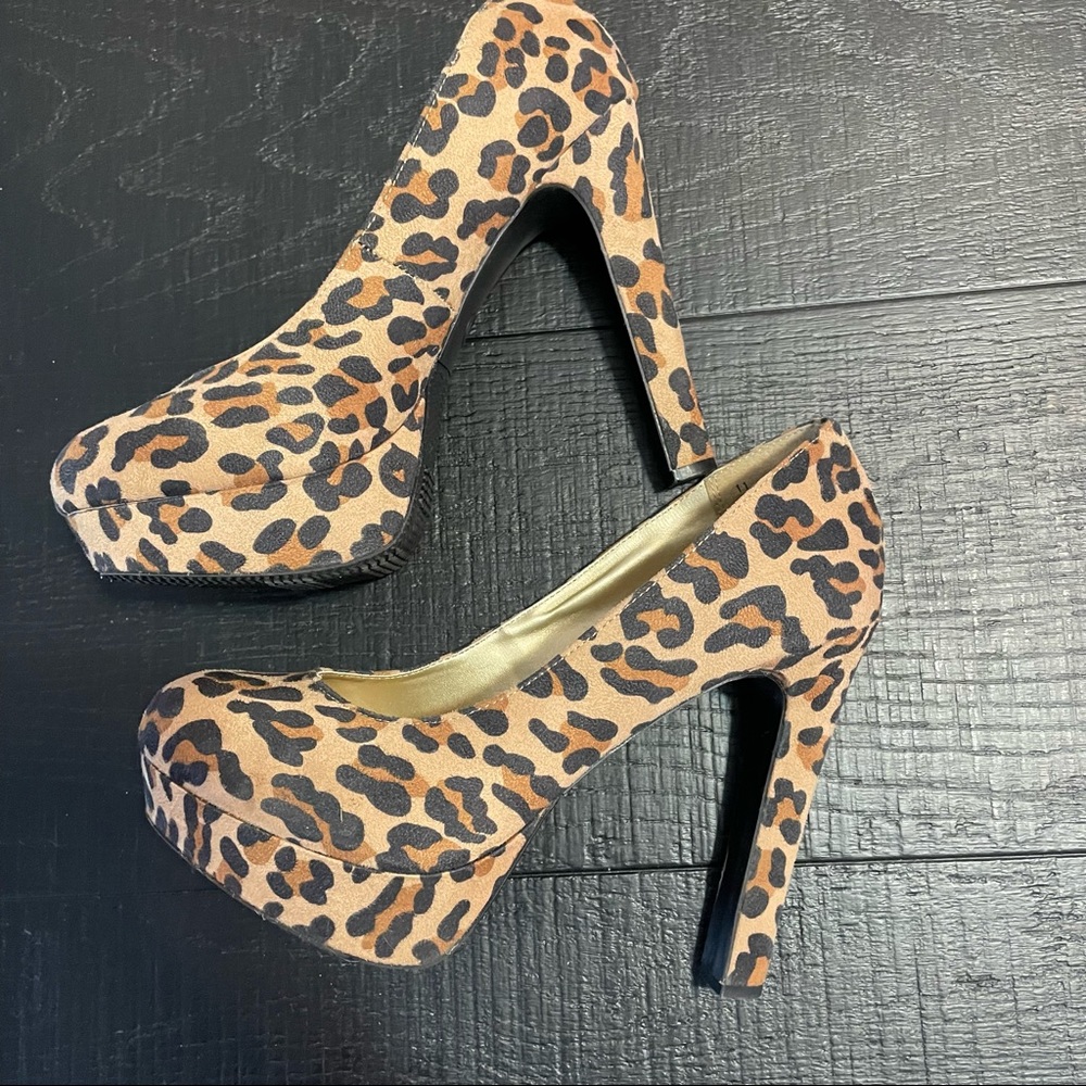 Leopard print Platform heels. Size 11 fits like a size 9.5